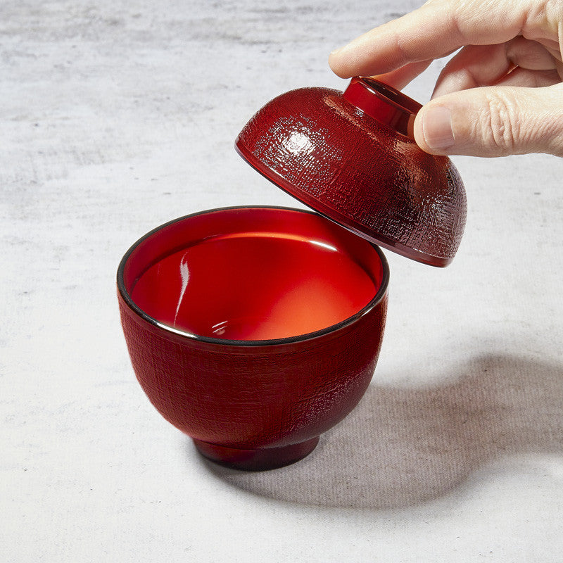 Traditional miso soup bowl with random lines and fabric-like pattern