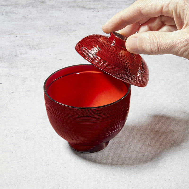 Traditional miso soup bowl with random lines and fabric-like pattern