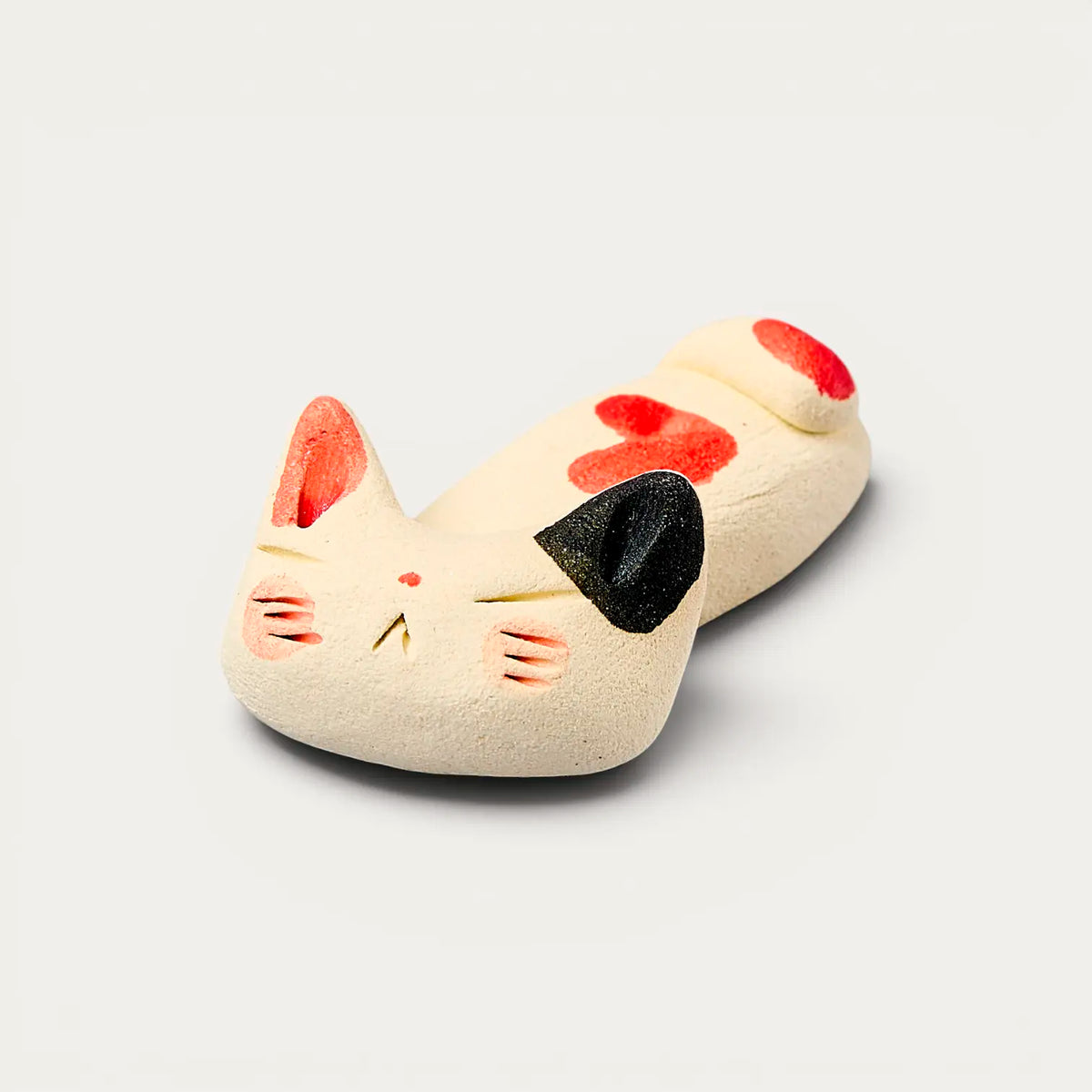 Stäbchenauflage schlafende Katze